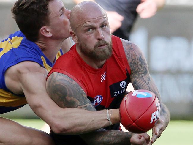 AFL 2nd Preliminary Final. West Coast Eagles vs Melbourne at Optus Stadium, Perth.  Melbourne's Nathan Jones looks to clear as he is tackled by West Coast's Jack Redden  . Pic: Michael Klein