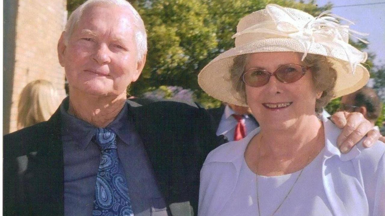 Aileen Bartlett, pictured with husband Basil, has questioned the long-term plans for aged care facilities managing Covid-19 outbreaks after her husband's room was locked down.