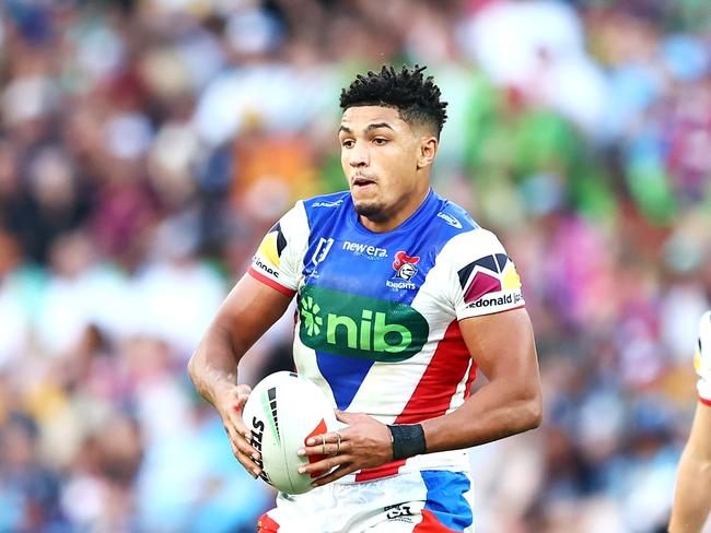 BRISBANE, AUSTRALIA - MAY 18: Kai Pearce-Paul of the Knights runs the ball during the round 11 NRL match between Gold Coast Titans and Newcastle Knights at Suncorp Stadium, on May 18, 2024, in Brisbane, Australia. (Photo by Chris Hyde/Chris Hyde)