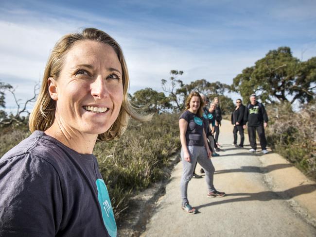 Fiona Redding (front) runs Happiness Hunter community walks at the Royal Botanic Gardens in Cranbourne. Picture: Eugene Hyland