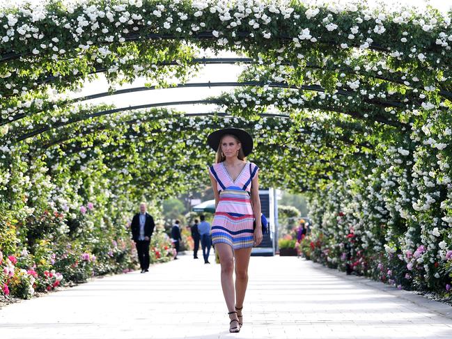 Racegoer Lilly Scheider arrives at Flemington. Picture: AAP Image/Julian Smith