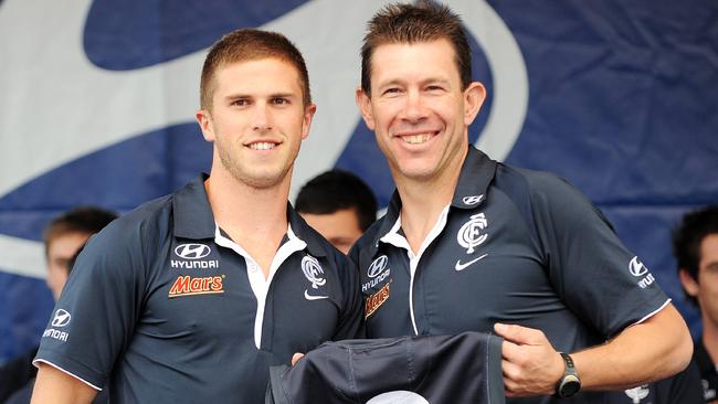 Marc Murphy (left) says Carlton should never have sacked Brett Ratten (right).