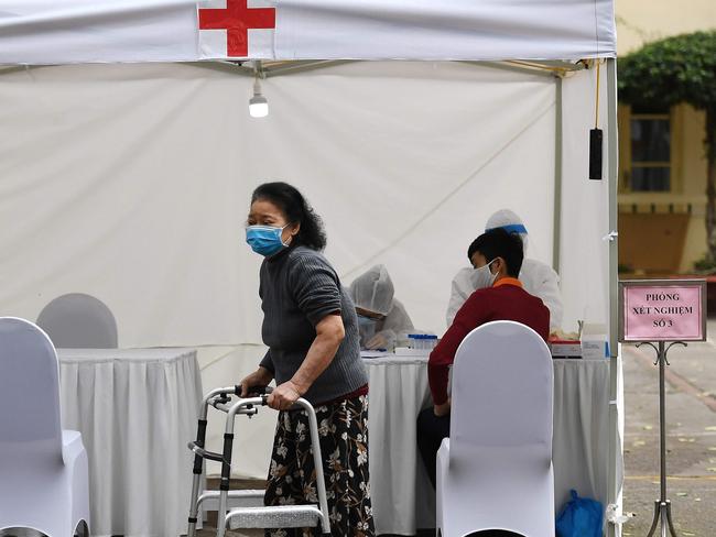 A makeshift rapid testing centre near the Bach Mai hospital in Hanoi, Vietnam. Picture: Nhac Nguyen/AFP