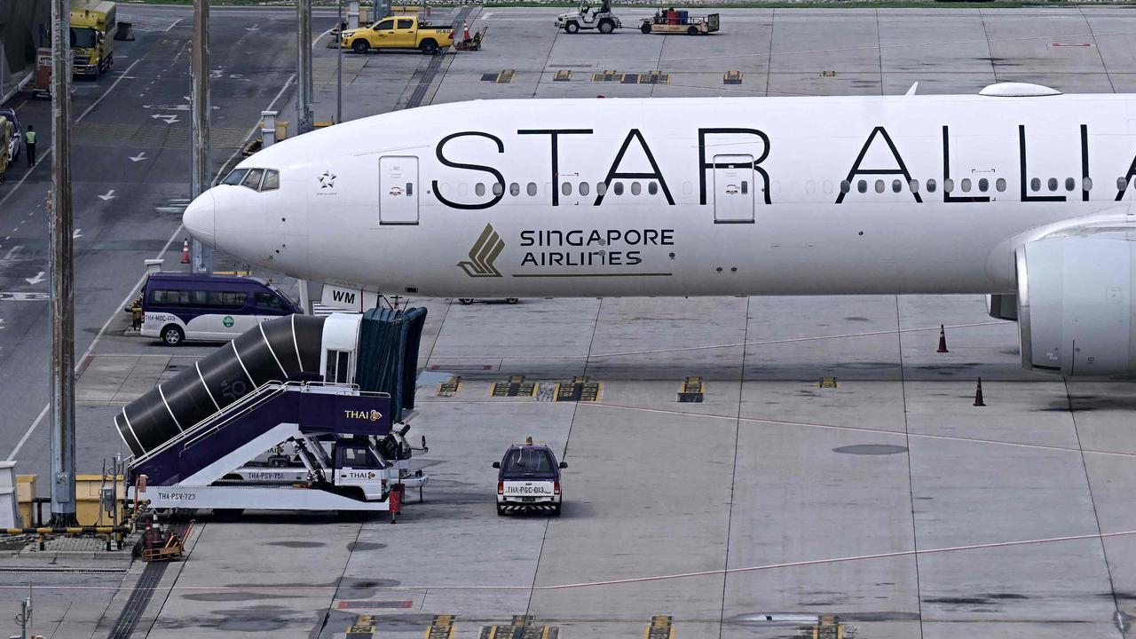 The Singapore Airlines flight SQ321, which was headed to Singapore from London before making an emergency landing in Bangkok due to severe turbulence, is seen on the tarmac at the Suvarnabhumi International Airport in Bangkok on May 22, 2024. A 73-year-old British man died and more than 70 people were injured on May 21 in what passengers described as a terrifying scene aboard a Singapore Airlines flight that hit severe turbulence, triggering an emergency landing in Bangkok. (Photo by Lillian SUWANRUMPHA / AFP)