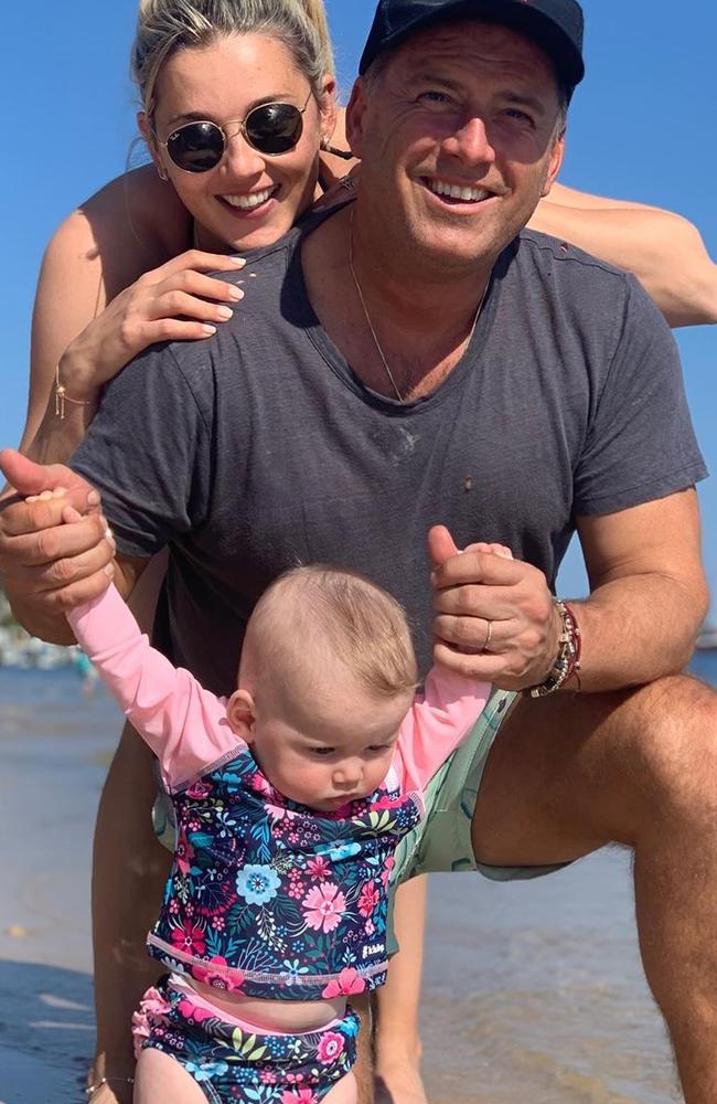 Karl and Jasmine Yarbrough with daughter Harper May at Palm Beach. Picture: Instagram.