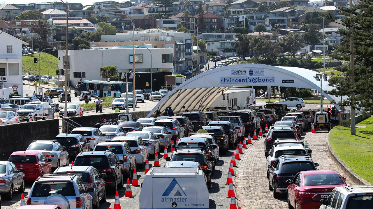 People are seen queuing in their cars at the Covid-19 testing site at Bondi Beach. Picture: NCA NewsWire / Gaye Gerard