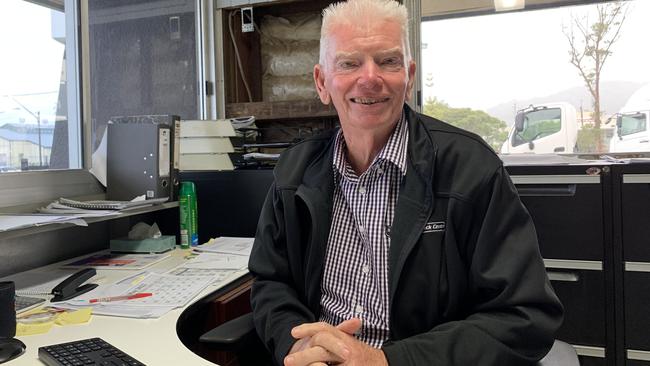 Steve Robinson, dealer principal of Southside Truck Centre in South Lismore, sits behind donated office furniture, 2022 was the first time he had water come close to his business. Picture: Cath Piltz