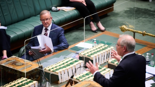 Opposition Leader Anthony Albanese (Left) reacts as Prime Minister Scott Morrison speaks during Question Time in the House of Representatives. The two leaders will go head-to-head next year at the Federal Election. Picture Getty