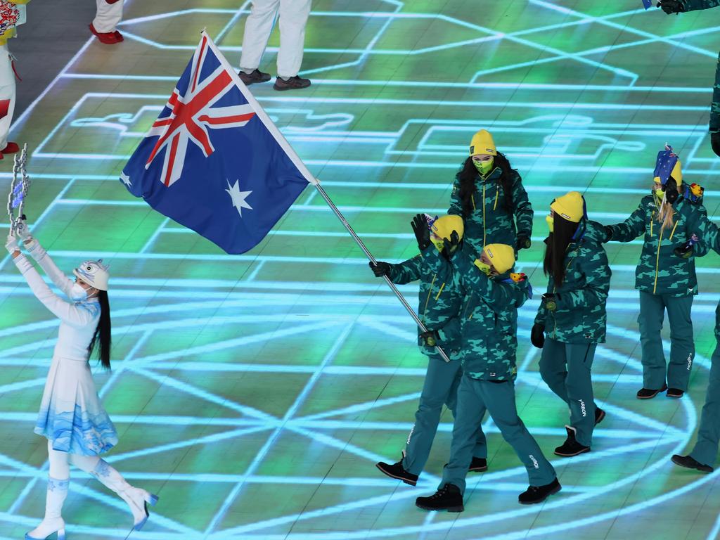 Brendan Kerry and Laura Peel carrying the Australian flag during the Opening Ceremony of the Beijing 2022 Winter Olympics