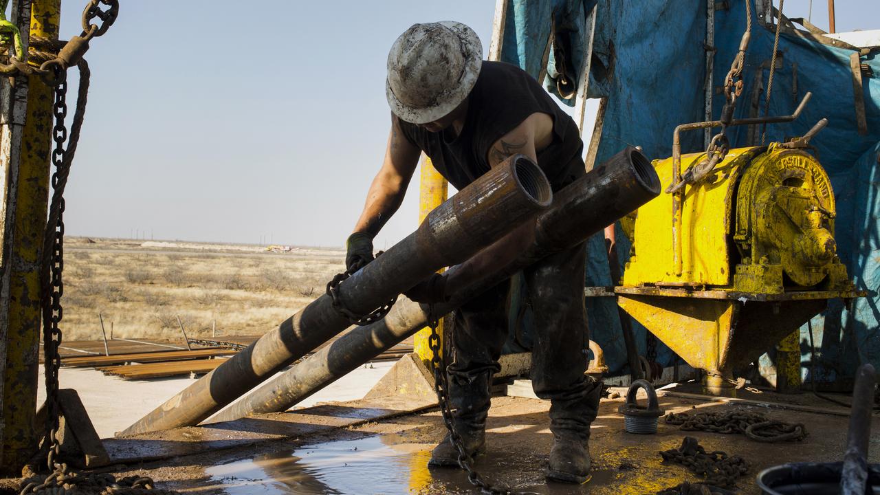 A worker on an onshore drill rig.