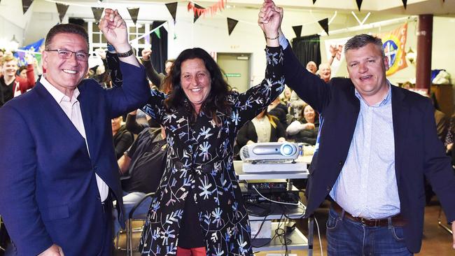 John Eren, Christine Couzens and Darren Cheeseman celebrate the Labor win in 2018. Picture: Alan Barber