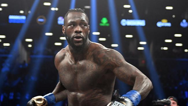 (FILES) In this file photo taken on March 03, 2018 heavyweight champion Deontay Wilder of the US fights contender Luis Ortiz of Cuba (out of frame) during their WBC heavyweight title fight in New York. The World Boxing Council has vowed to investigate heavyweight champion Deontay Wilder after he was quoted as saying he wanted to cause a death in a boxing ring. In an interview with syndicated New York radio show, The Breakfast Club, Wilder triggered revulsion throughout boxing by saying he hoped to "have a body" on his record.  / AFP PHOTO / Timothy A. CLARY