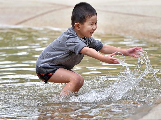 Harrison Quach, 3, enjoys the wading pool at Putney Park, Putney. Picture: Troy Snook