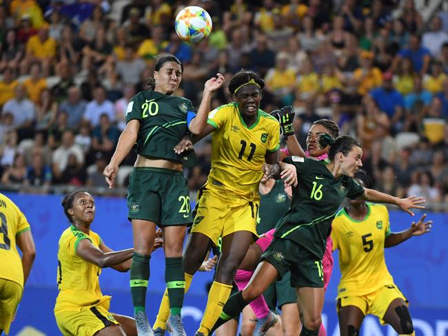 Sam Kerr climbs high for a header against Jamaica. Picture: AFP