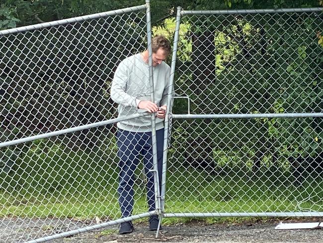 Australian chairman of selectors George Bailey leaving Queenborough Oval through a back entrance. Picture: James Bresnehan