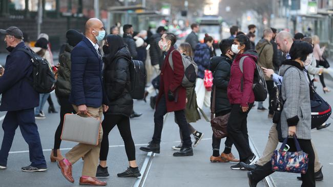 Melburnians in the CBD on Thursday, where life is slowly returning to normal. Picture: NCA NewsWire/David Crosling