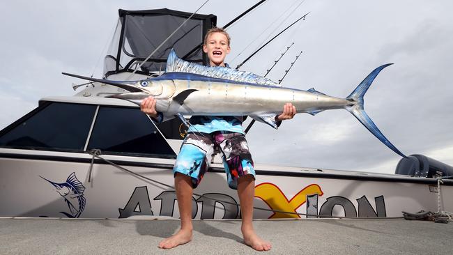 7-year-old Gold Coast schoolboy hooks record catch with black marlin