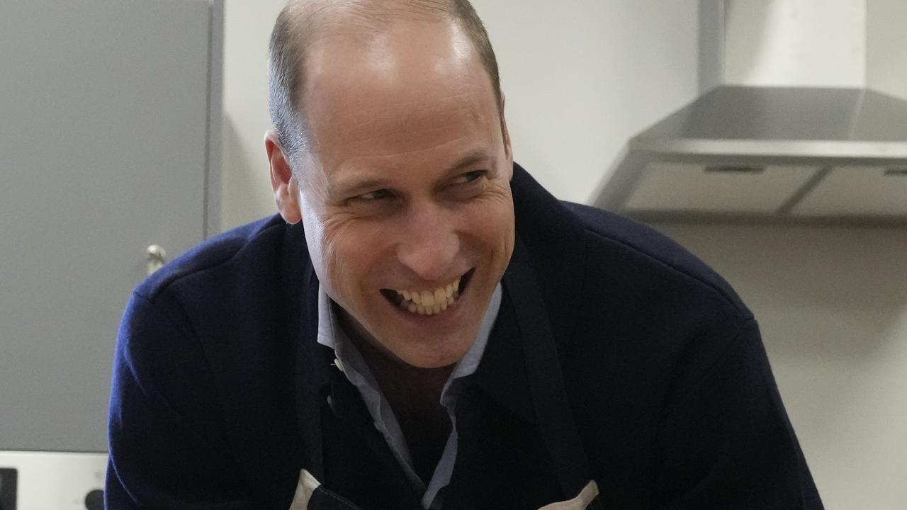 Prince William was all smiles when visiting the youth club in London. Picture: Frank Augstein/WPA Pool/Getty Images