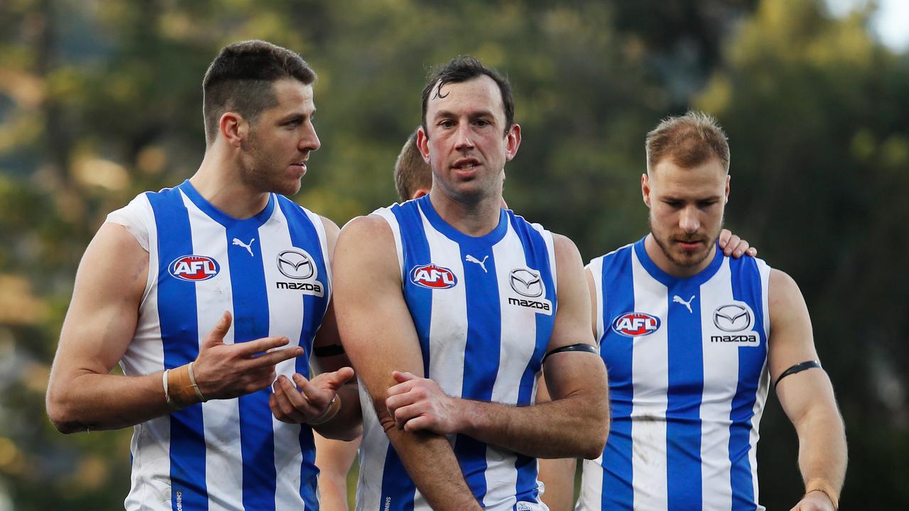 Tristan Xerri and Todd Goldstein have had it rough. Photo by Dylan Burns/AFL Photos via Getty Images.