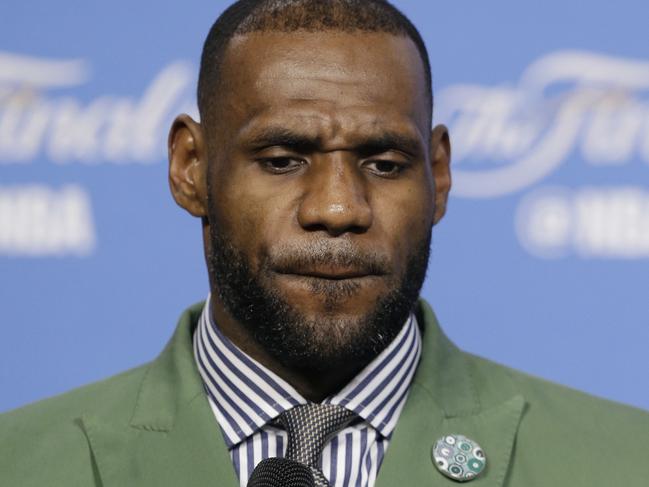 Cleveland Cavaliers' LeBron James answers a question early Saturday, June 11, 2016, after the Golden State Warriors defeated the Cavaliers 108-97 in Game 4 of basketball's NBA Finals in Cleveland. (AP Photo/Ron Schwane)