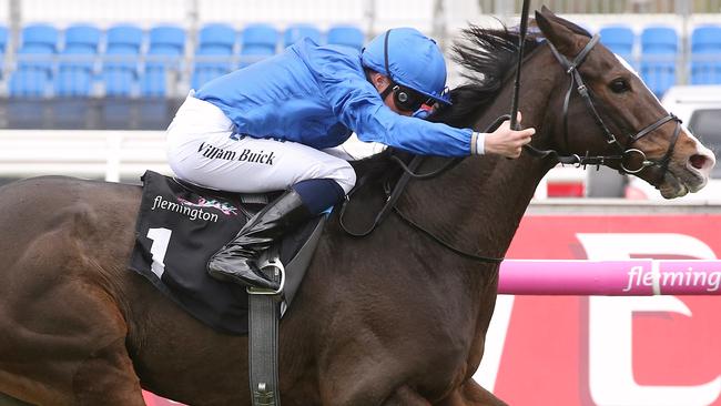 William Buick salutes in last year’s Queen Elizabeth Stakes on Francis of Assisi. Picture: Wayne Ludbey