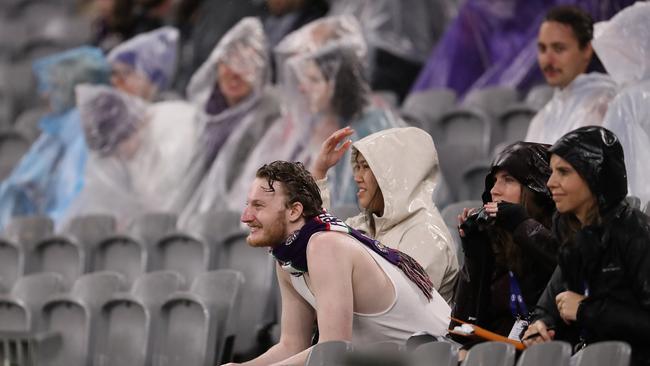 It was a wet slog for fans, too. Picture: Getty Images