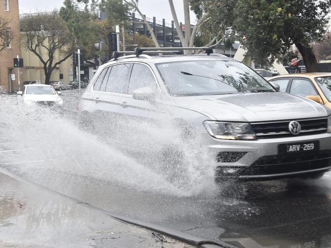 Motorists had to avoid waterlogged roads around the region. Heavy rain lashed Geelong overnight with region getting close to its monthly average rainfall in less than 24 hours. Picture: Alan Barber