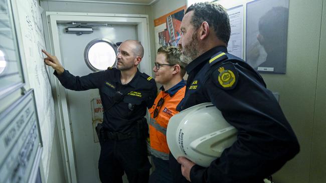 A quick chat with the captain before the search begins. Picture: Mark Brake