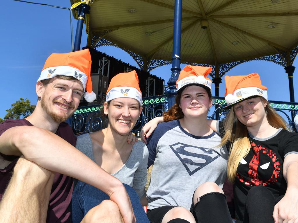 Abel Freeman, Emily Hatowskyj, Sofie Storr and Megan Hastings at the 2019 Elder Park Carols by Candlelight. Picture: AAP / Keryn Stevens