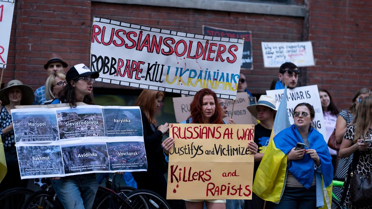 People protest outside of Scotiabank Theatre about the documentary "Russians at War" playing at the Toronto International Film Festival, in Toronto, on Tuesday Sept. 10, 2024. Picture: The Canadian Press/Alamy Live News