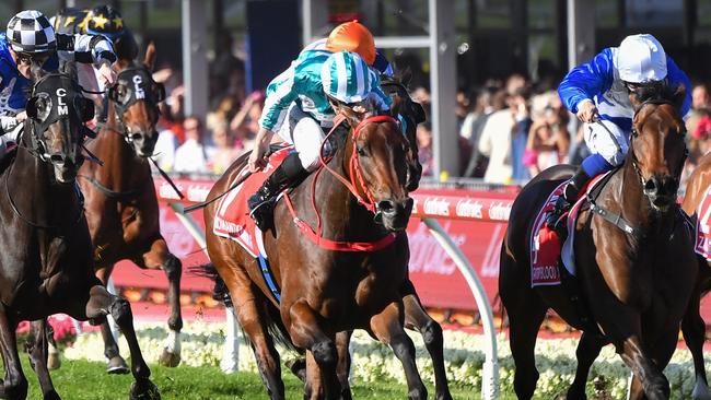 Romantic Warrior charges home to win the Cox Plate at The Valley on Saturday. Picture: Pat Scala/Racing Photos via Getty Images