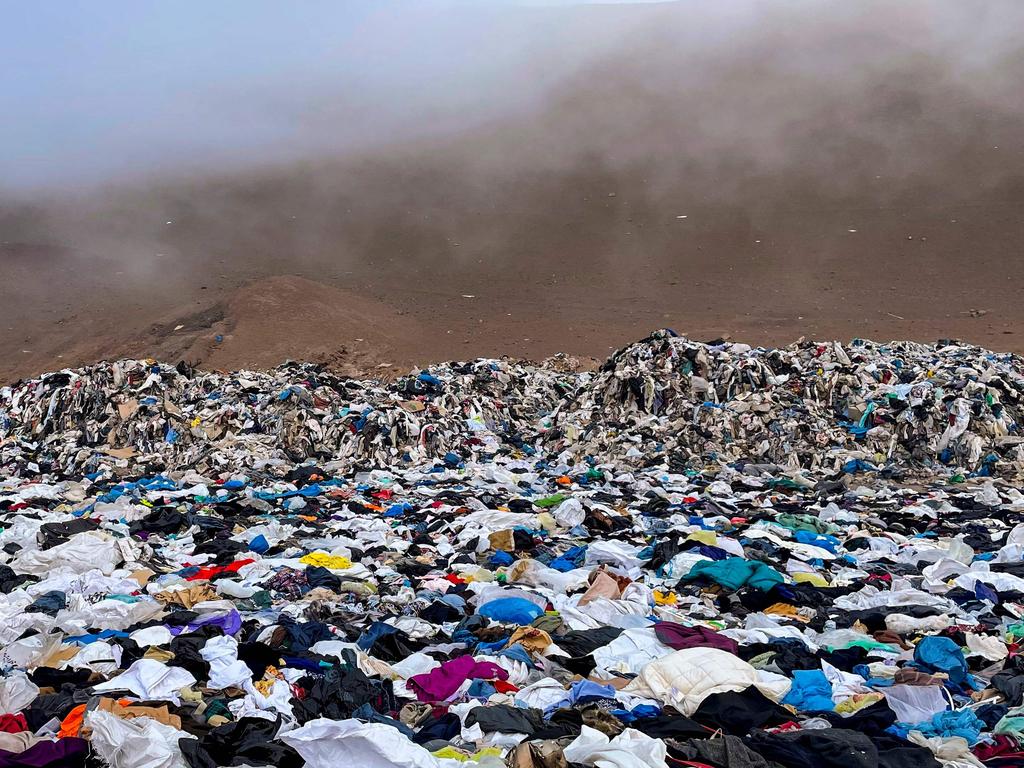 Massive piles of clothes. Picture: Martin Bernetti/AFP