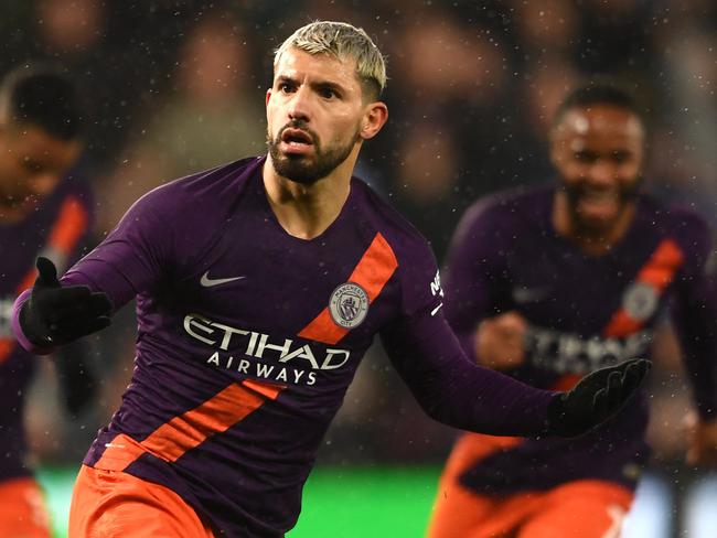 SWANSEA, WALES - MARCH 16: Sergio Aguero of Manchester City celebrates his team's second goal which rebounds off Kristoffer Nordfeldt of Swansea City for an own goal during the FA Cup Quarter Final match between Swansea City and Manchester City at Liberty Stadium on March 16, 2019 in Swansea, United Kingdom. (Photo by Harry Trump/Getty Images)