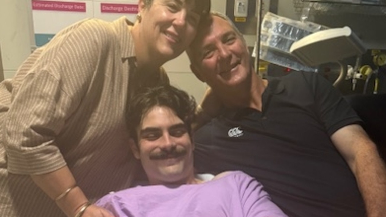 Michael Maloney with his family in hospital. Photo: Supplied