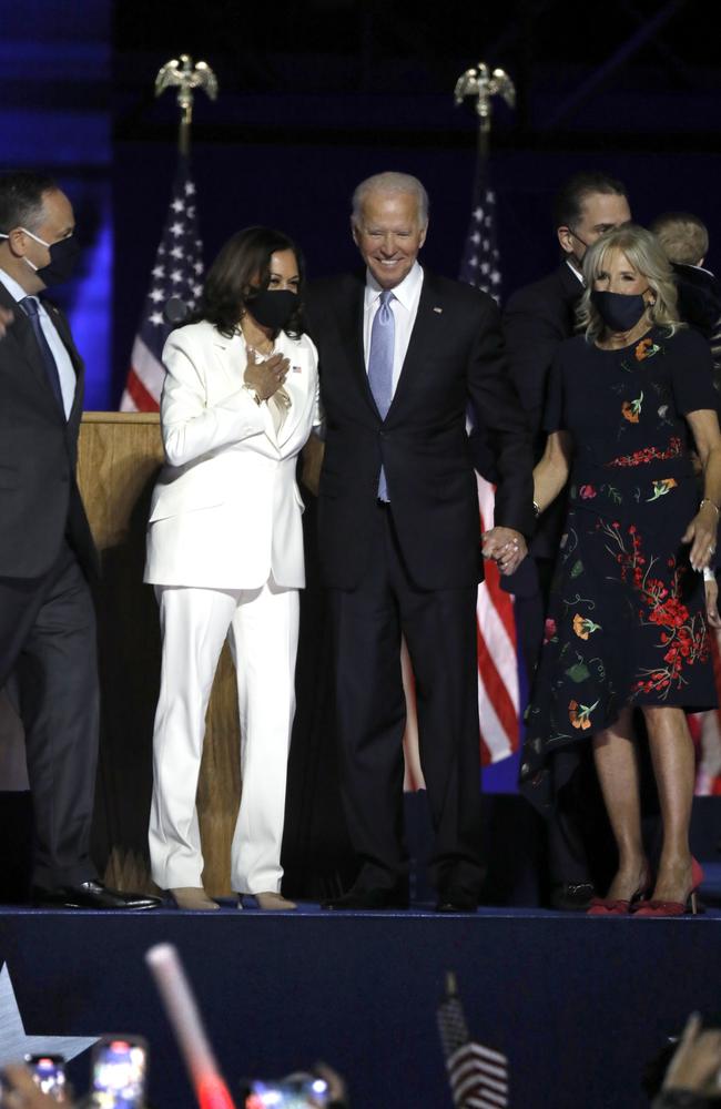 President-elect Joe Biden (second from right) and Vice-President-elect Kamala Harris (second from left) address their supporters at Chase Center in Wilmington. Picture: Carolyn Cole/Los Angeles Times via Getty Images