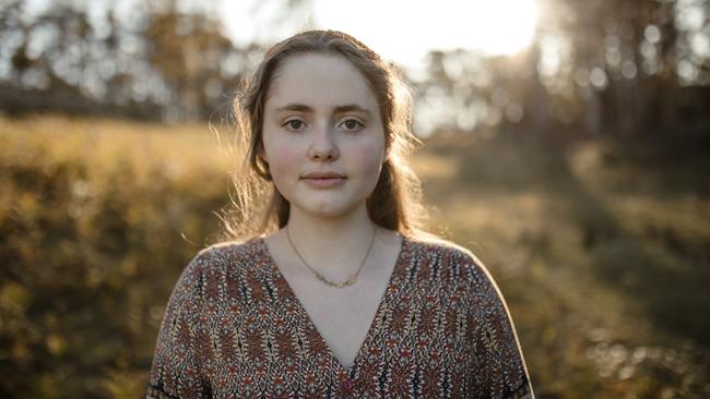 Evelyn Baehr is a 16-year-old from Tasmania's Huon Valley, who has been impacted by long Covid. Picture: Naomi Mackie/Billy Button Photography