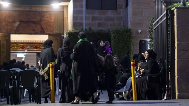 Mourners were seen sitting outside Al Rahman Mosque in Kingsgrove on Tuesday. Picture: NewsWire / Monique Harmer