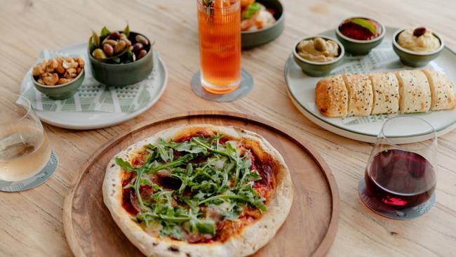 The Tamborine offers a bar snack and pizza menu.
