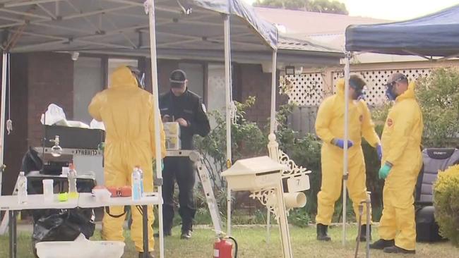 The drug lab is dismantled by police officers. Picture: SAPOL