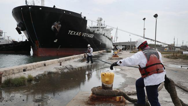 The June contract for crude fell 25pc on Monday and 21pc to $US10.36 a barrel in Asian trading on Tuesday. Picture: Getty Images/AFP