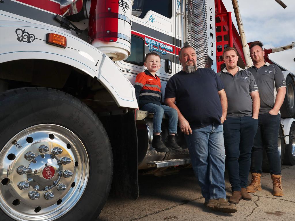 Adam Watson with grandson Campbell 4 and sons Jacab (Jacab) and Bradan (Bradan). Watson Haulage based in the Huon Valley truck company and family with a history of forest workers have been stiffed by the government awarding a contract to a Victorian firm. Picture: Nikki Davis-Jones