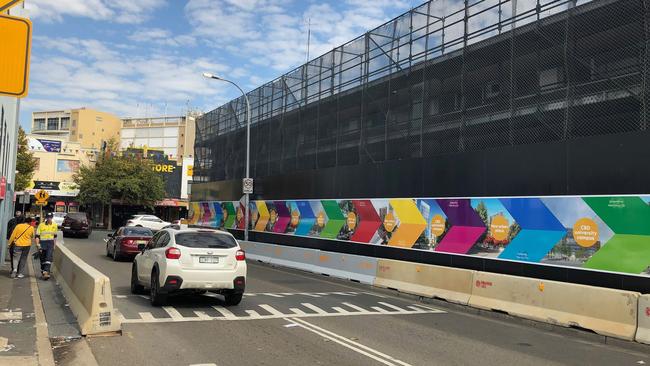 Scaffolding and hoardings have been erected around the old Blacktown Mall site at Warrick Ln as crews prepare for demolition. Picture: Kate Lockley