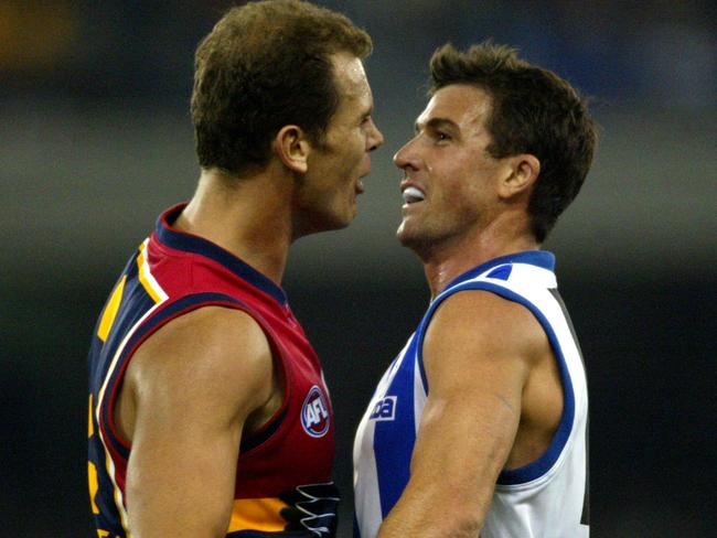 Anthony Stevens comes face to face with Wayne Carey during a Crows match against the Kangaroos after the affair was revealed.