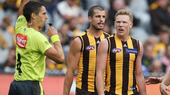 Hawthorn’s James Sicily looks at umpire Justin Power after giving away a free kick to Bulldog Josh Schache. Pic: Michael Klein