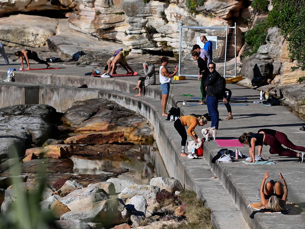 People are seen exercising at Bondi Beach, in Sydney. Picture: NCA NewsWire/Bianca De Marchi