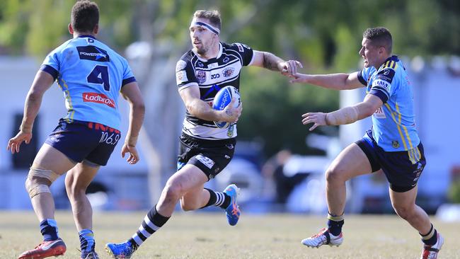 Bryce Cartwright (C) playing for the Tweed Heads Seagulls against the Norths Devils. Picture: SMP Images