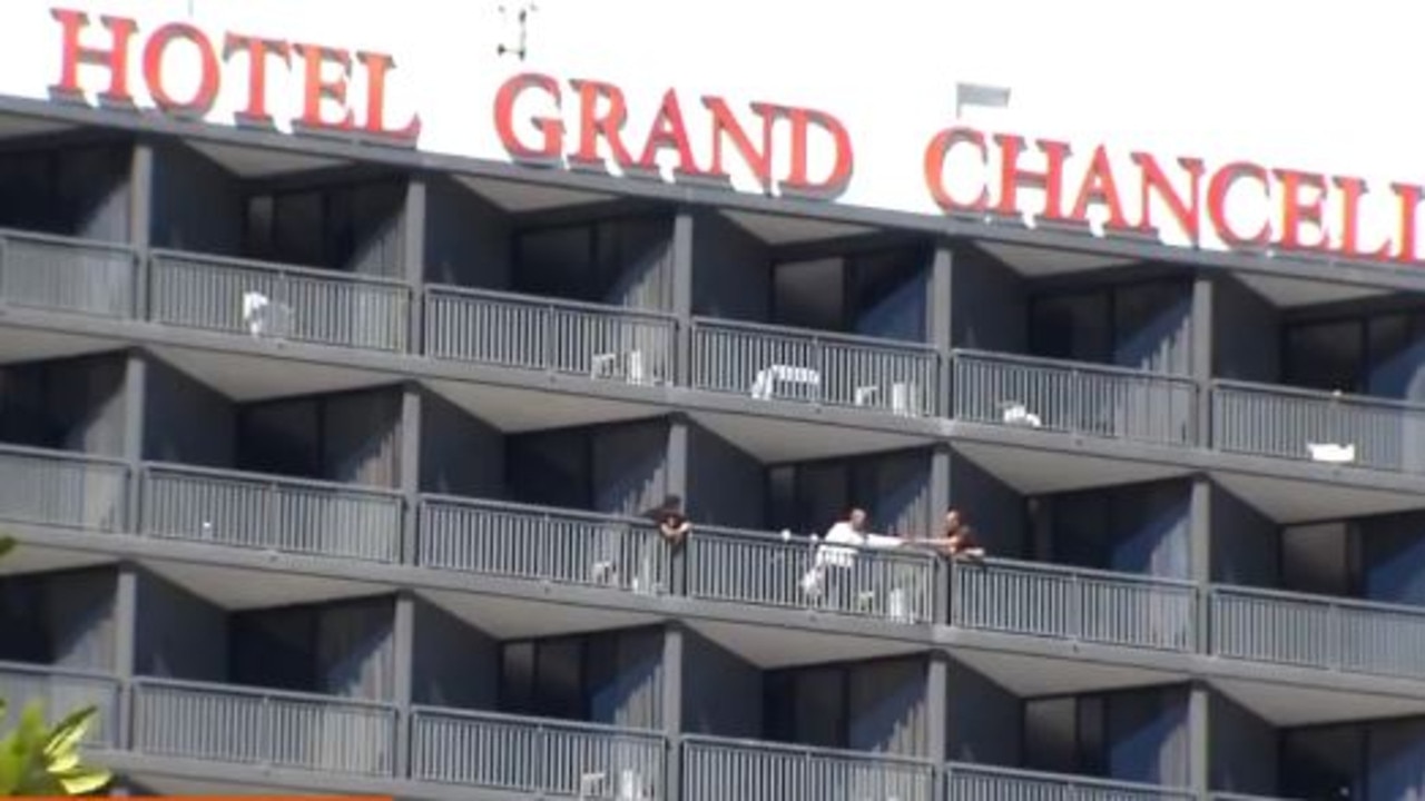 Quarantined visitors have been filmed passing items to one another over balconies at Brisbane's Hotel Grand Chancellor. Picture: Sunrise