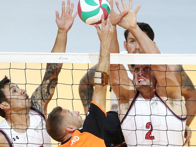 Players compete at the net during the sitting volleyball match between USA and Netherlands. Picture: Mark Metcalfe/Getty Images for The Invictus Games Foundation