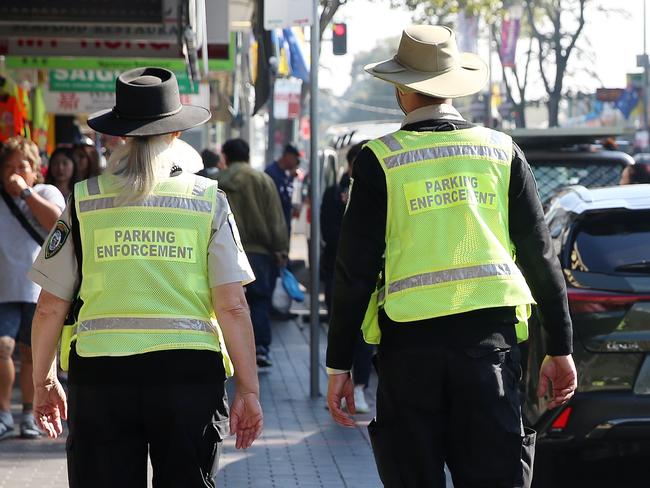 SUNDAY TELEGRAPH - 22/5/19Sunday Telegraph visits the streets in Western Sydney which have the highest turn over of parking fines. Parking rangers pictured on John St in Cabramatta. Picture; Sam Ruttyn