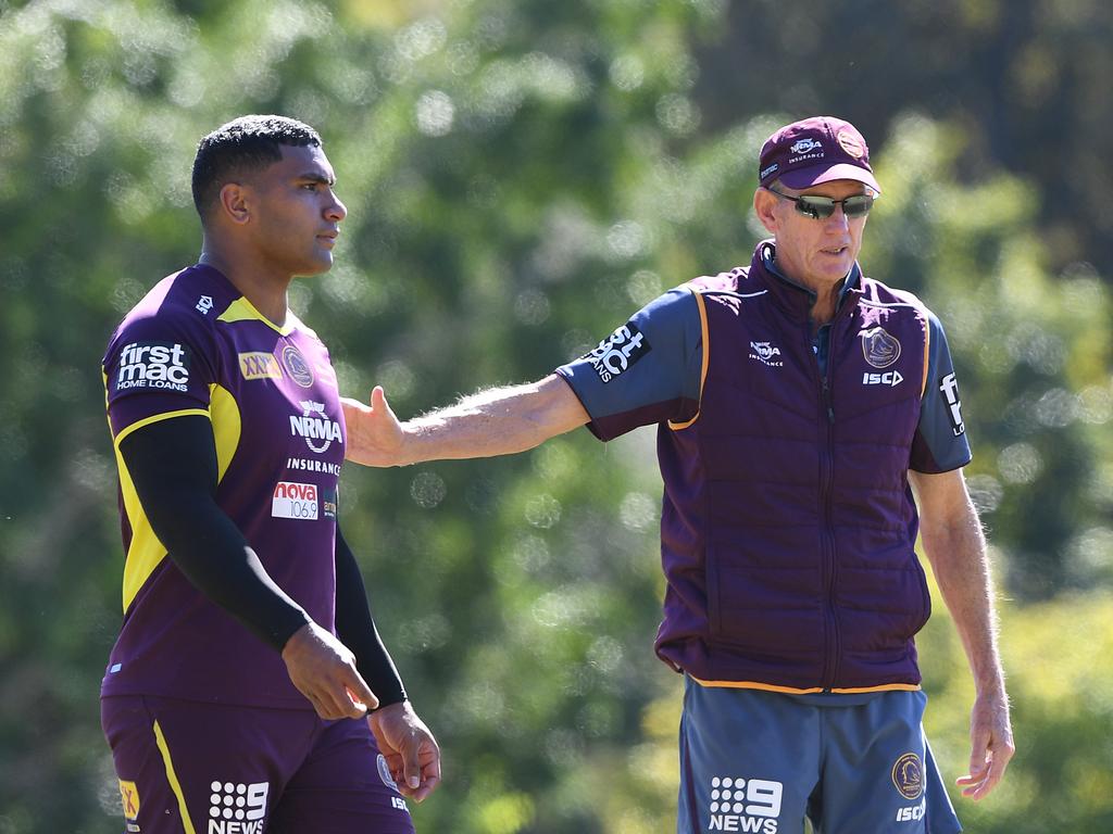 Tevita Pangai Junior and coach Wayne Bennett are seen during the Brisbane Broncos training session in Brisbane, Wednesday, August 22, 2018. (AAP Image/Dave Hunt) NO ARCHIVING